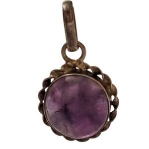 Silver Tone Pendant with Purple Stone